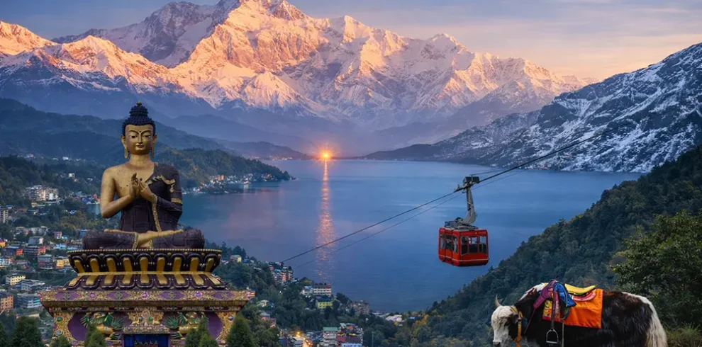Himalayan blended view of Sikkim, Darjeeling, with a giant Buddha statue, a ropeway and the snow-covered Kanchenjunga range