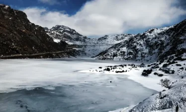 picture of snow covered guru dongamr lake in north sikkim