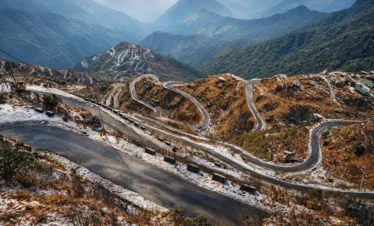 Zuluk zig-zag road on the Old Silk Route in East Sikkim with dramatic mountain valleys and winding Himalayan hairpin bends