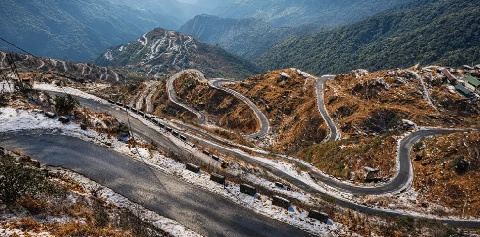 Zuluk zig-zag road on the Old Silk Route in East Sikkim with dramatic mountain valleys and winding Himalayan hairpin bends